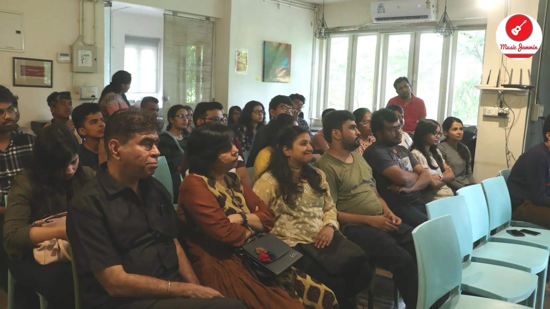Audience listening at a Music Jammin gathering