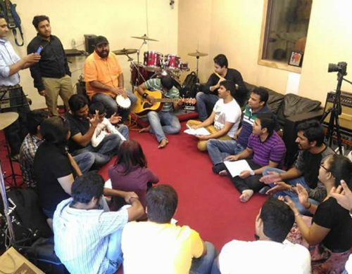 A packed Music Jammin session at an indoor venue